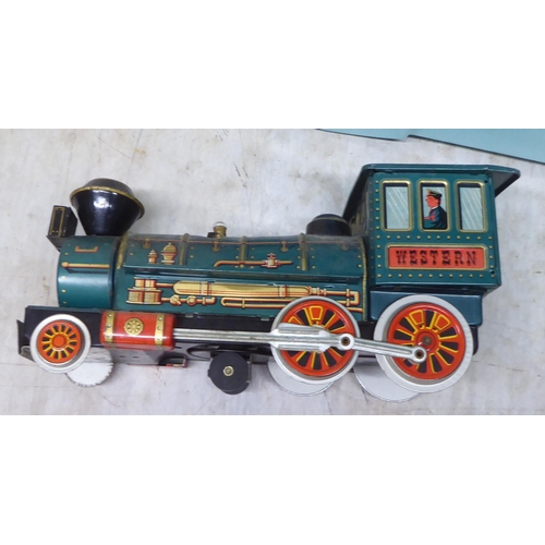 81 - Toys and games: to include vintage model electric trains; and a compendium