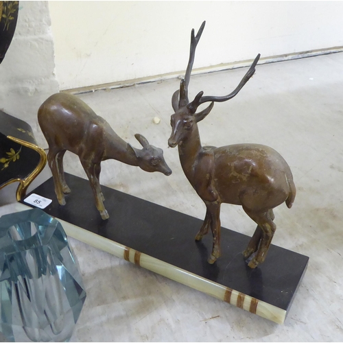 85 - A mixed lot: to include an Art Deco cast metal stag and deer group  9