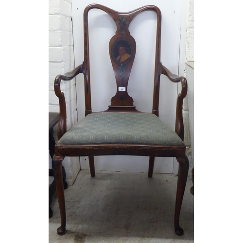 92 - A reproduction of a Continental Regency design, overpainted mahogany splat back open arm chair, rais... 