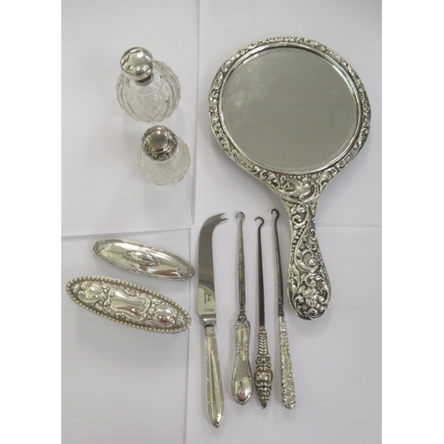 6 - Silver backed/mounted dressing table items: to include a spherical cut glass perfume bottle with a h... 