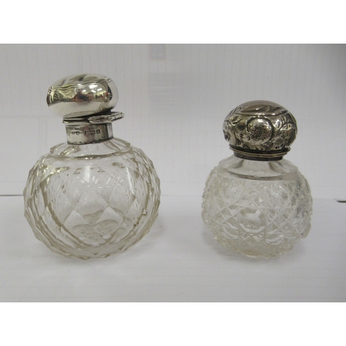 6 - Silver backed/mounted dressing table items: to include a spherical cut glass perfume bottle with a h... 