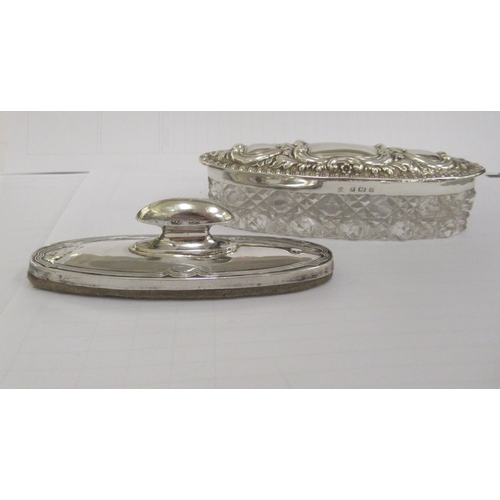 6 - Silver backed/mounted dressing table items: to include a spherical cut glass perfume bottle with a h... 