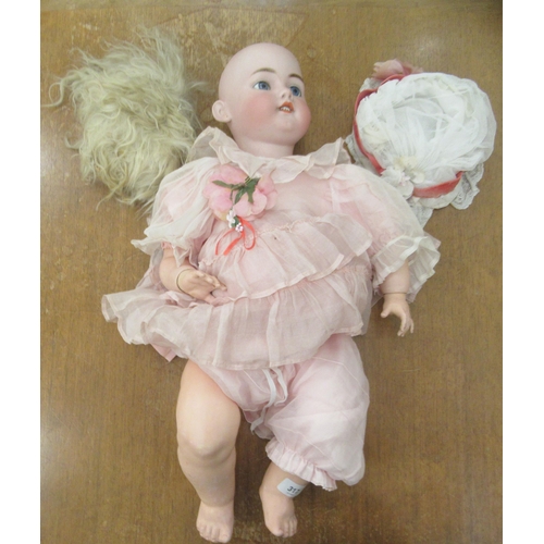 317 - A Simon & Halbig dressed bisque head doll with mobile limbs  impressed 1079DEP  24