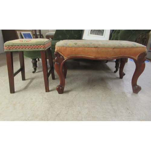 5 - A 19thC carved mahogany framed serpentine outlined stool with an overstuffed and tapestry upholstere... 