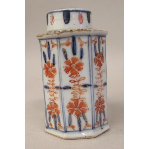 104 - A 19thC Chinese Imari porcelain tea caddy of elongated octagonal form and a cover, decorated in coba... 