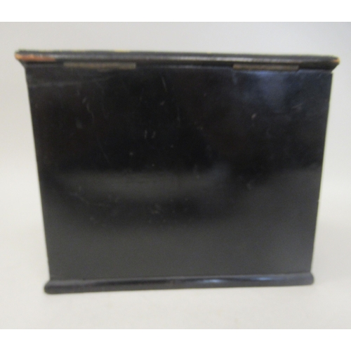 133 - A late 19thC black lacquered, boulleworked casket of trapezium form, the angled, lockable hinged lid... 