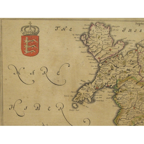 136 - A 17thC John Blaeu coloured map 'Wallia Principatvs Vulgo Wales' with a decoratively scrolled armori... 