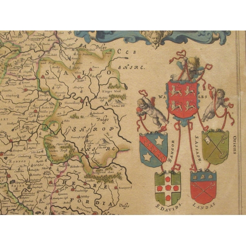 136 - A 17thC John Blaeu coloured map 'Wallia Principatvs Vulgo Wales' with a decoratively scrolled armori... 