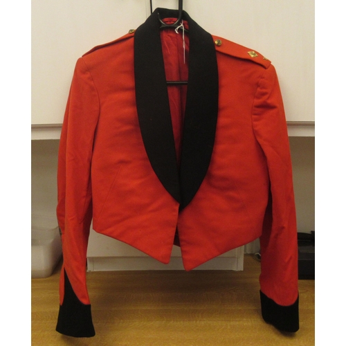 151 - A British Army mess jacket and trousers with uniform pips (Please Note: this lot is subject to the s... 