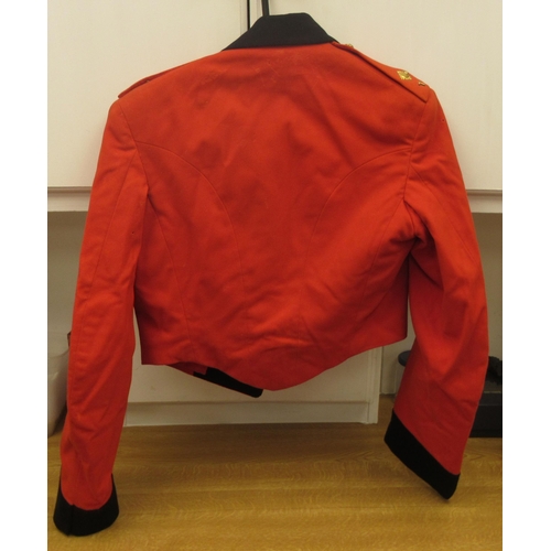 151 - A British Army mess jacket and trousers with uniform pips (Please Note: this lot is subject to the s... 