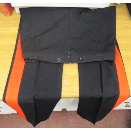 151 - A British Army mess jacket and trousers with uniform pips (Please Note: this lot is subject to the s... 