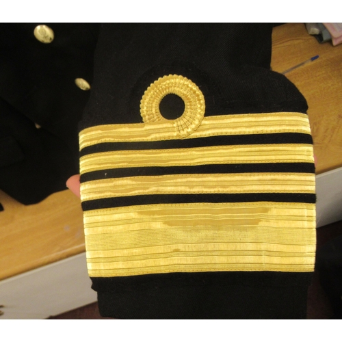 152 - A Royal Navy submariners double-breasted tunic with emblems and braided sleeves, medal ribbons, incl... 