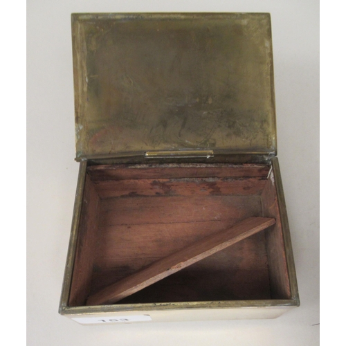 153 - A mid 20thC brass cigarette box with straight sides and a hinged lid, enclosing a cedar lined interi... 