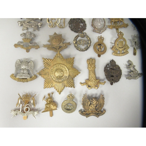 171 - Approx. fifty military cap badges and other insignia, some copies: to include The Kings Shropshire L... 