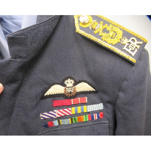 182 - An RAF Senior Officer's uniform, comprising a tunic with medal ribbons and braided epaulettes, a blu... 