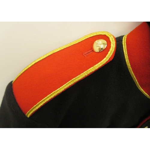 192 - A British REME Band ceremonial black tunic with a red collar, cuffs and epaulettes (Please Note: thi... 