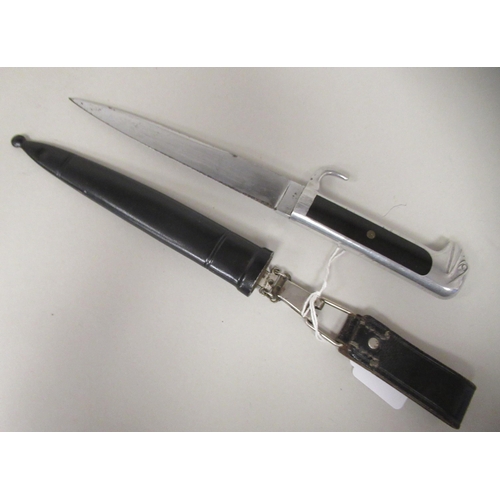 213 - An Italian Fascist era, political officer's dress dagger with an aluminium black celluloid handle an... 