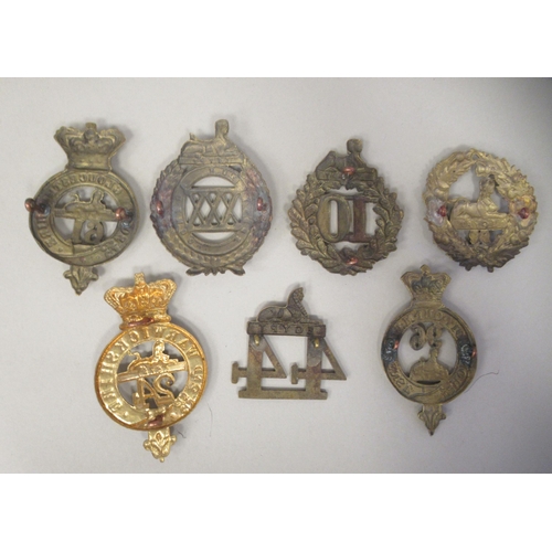 226 - Seven 19thC military cap badges, some copies: to include South Gloucester(Please Note: this lot is s... 