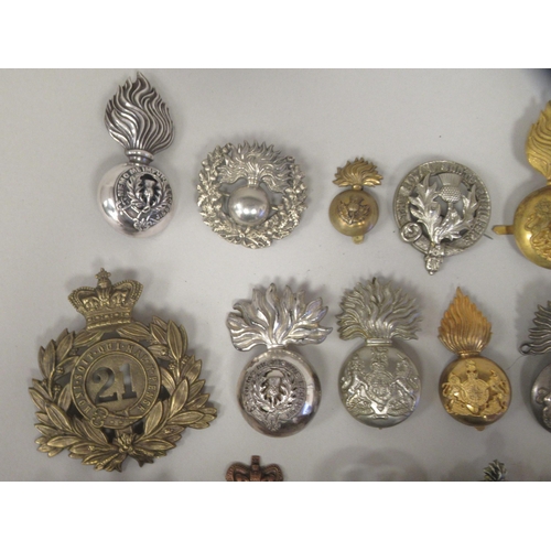 232 - Royal Scots Fusiliers and related military badges, some copies(Please Note: this lot is subject to t... 