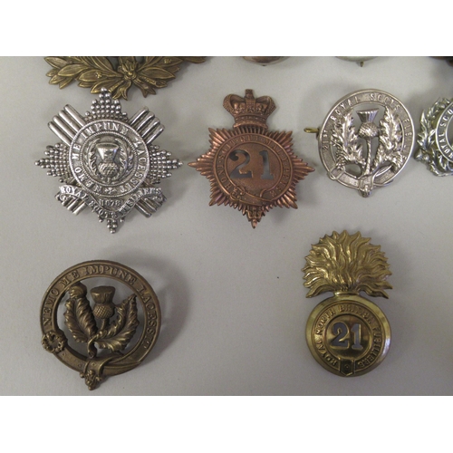 232 - Royal Scots Fusiliers and related military badges, some copies(Please Note: this lot is subject to t... 