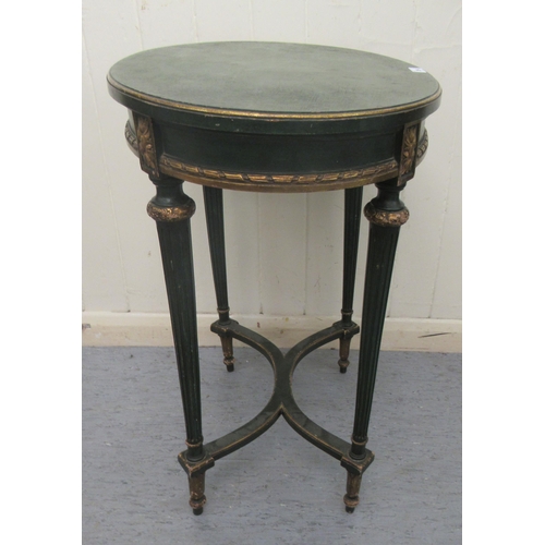 234 - An early 20thC Louis XVI style, green and parcel gilt occasional table, the oval top on tapered, ree... 