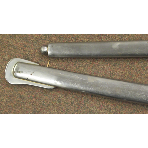 235 - Six various 20thC iron tsubas, two similar polished, stainless steel scabbards with suspension rings... 