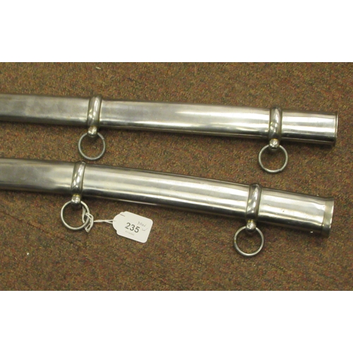 235 - Six various 20thC iron tsubas, two similar polished, stainless steel scabbards with suspension rings... 