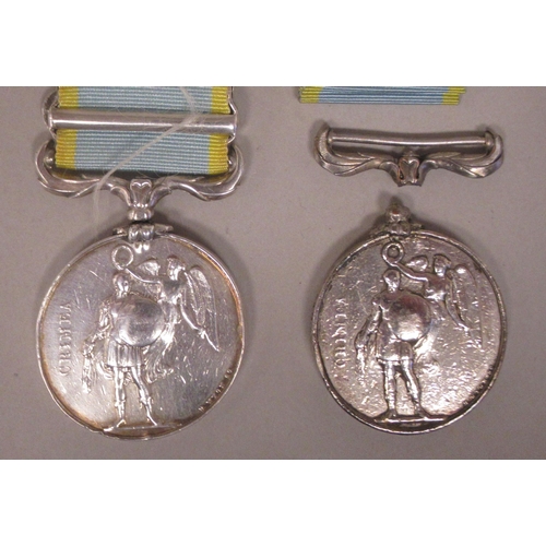 244 - A Crimea medal with Queen Victoria's profile portrait on the obverse and ribbon; three oakleaf bars ... 