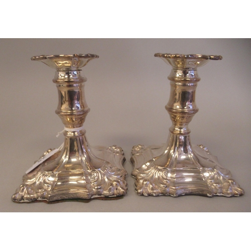 25 - A pair of 18/19thC style loaded silver dwarf candlesticks, each with a detachable sconce and vase sh... 