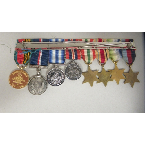 254 - Eight British 1939-45 onwards, miniature dress medals on ribbons and a bar brooch(Please Note: this ... 