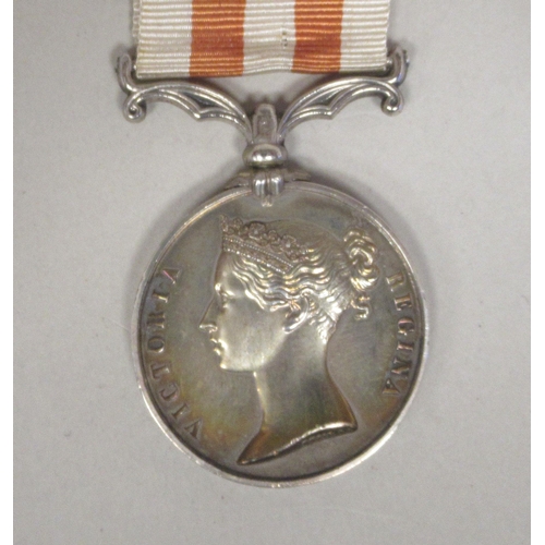 255 - A Victoria Indian Mutiny medal 1857-1858 the monarch's profile portrait on the obverse, inscribed Th... 