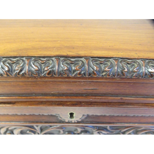 26 - A William IV inspired mahogany casket, having straight sides and a hinged lid with bead, stiff leaf,... 