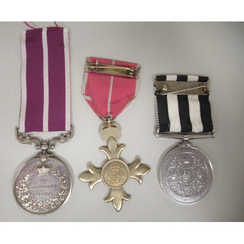 260 - A King George V medal for Meritorious Service, inscribed M 25559 Cpl. ACSS Mjr J O Connor RASO with ... 