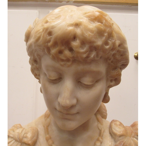 263 - A late 19thC, probably French, carved alabaster bust, a young woman in pensive pose, on a turned, mo... 