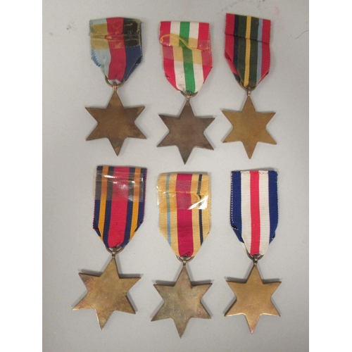 281 - Six Second World War Stars on ribbons for The Pacific, Burma, France and Germany 1939-1945, Africa a... 