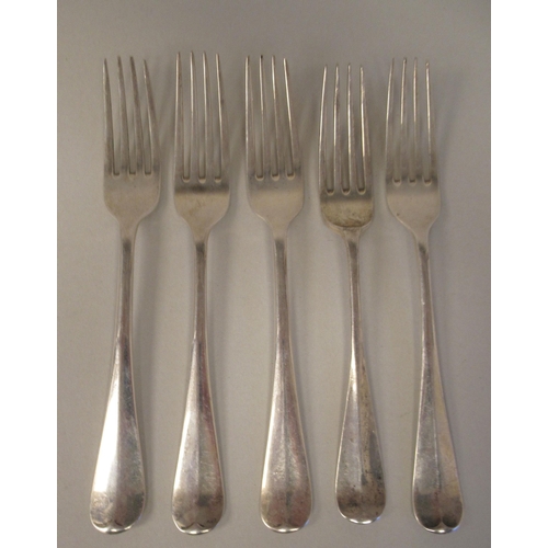 33 - Silver Hanoverian pattern flatware, viz. twelve table forks, twelve dessert forks and six spoons; pl... 