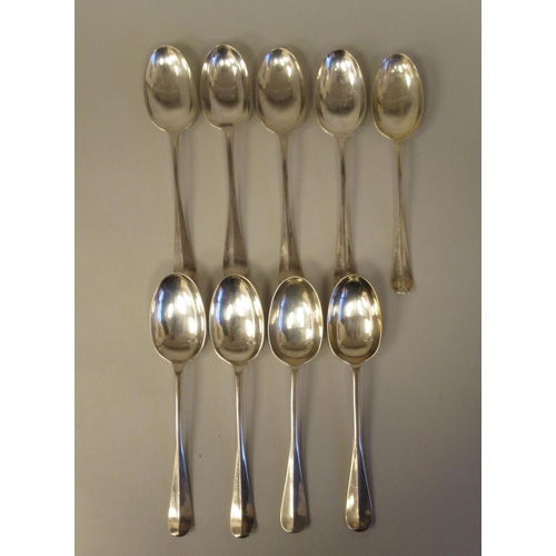 33 - Silver Hanoverian pattern flatware, viz. twelve table forks, twelve dessert forks and six spoons; pl... 