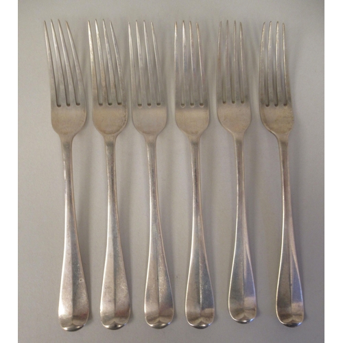 33 - Silver Hanoverian pattern flatware, viz. twelve table forks, twelve dessert forks and six spoons; pl... 