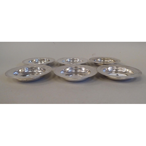 4 - A matched set of six silver Armada design dishes  mixed marks  4.5