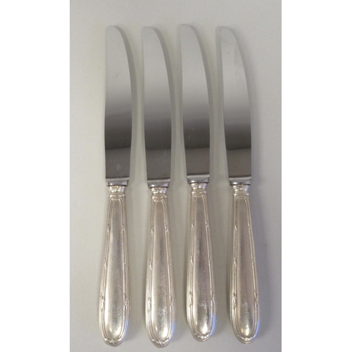 41 - Mondial foreign white metal ribbon tied thread pattern flatware and cutlery, viz. a set of four tabl... 