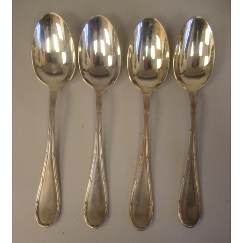 41 - Mondial foreign white metal ribbon tied thread pattern flatware and cutlery, viz. a set of four tabl... 