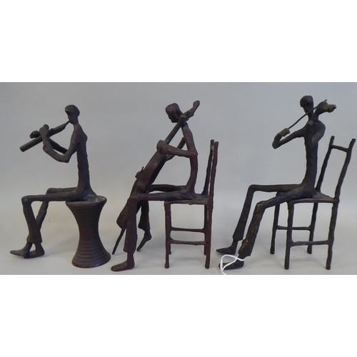 44 - In the manner of Giacometti - a series of three painted bronze sculptures, featuring seated jazz mus... 