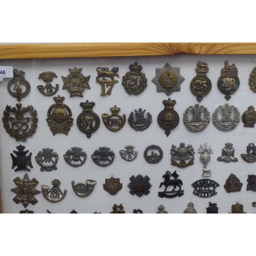 46 - Over ninety military cap badges and other insignia, some copies: to include 1st Battalion, Blackpool... 