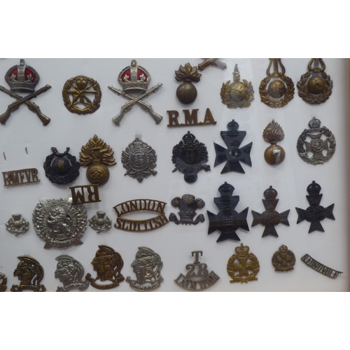 48 - Over one hundred and twenty military cap badges and other insignia, some copies: to include Glider R... 