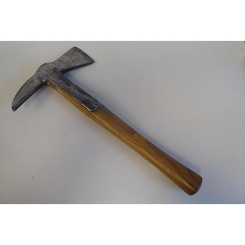 50 - A vintage fireman's axe, the steel head stamped W-Gilpin, made in England, on a wooden handle 