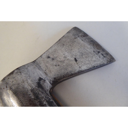 50 - A vintage fireman's axe, the steel head stamped W-Gilpin, made in England, on a wooden handle 