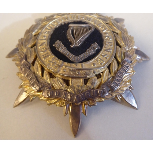 60 - A Connaught Rangers military helmet plate (Please Note: this lot is subject to the statement made in... 