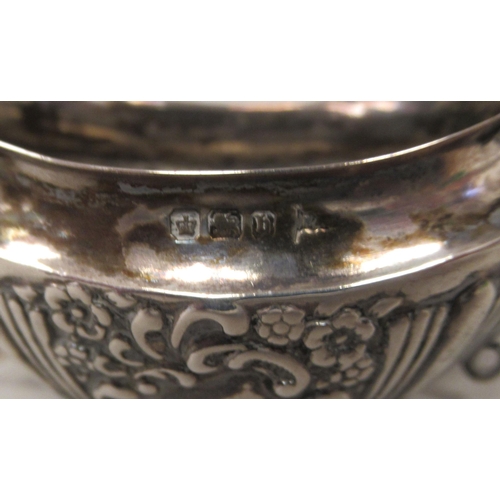 68 - A Continental silver dressing table canister of shouldered elongated octagonal form with a cover, em... 