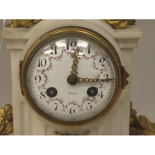 70 - An early 20thC French mottled grey onyx and decoratively cast gilt metal mounted mantel clock with s... 