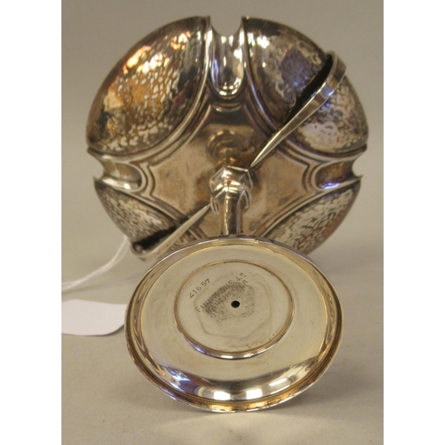 72 - An Art Nouveau silver pedestal sweet dish with opposing looped wire handles, elevated on a slender o... 